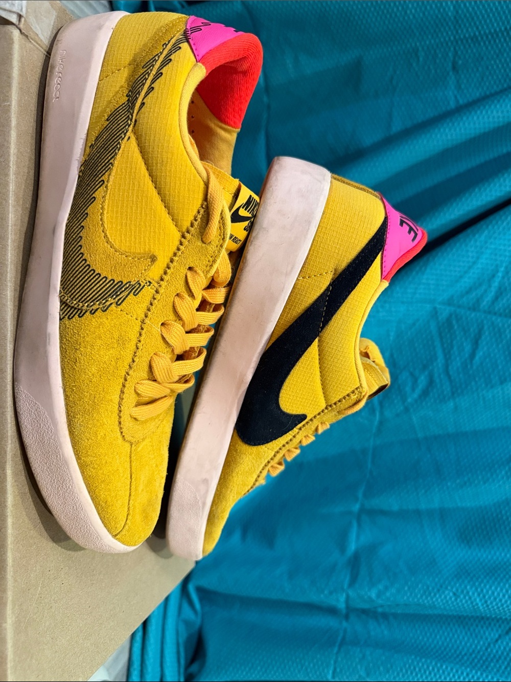 Nike Yellow Suede Low-Top Sneakers with Black Swoosh and Pink Heel